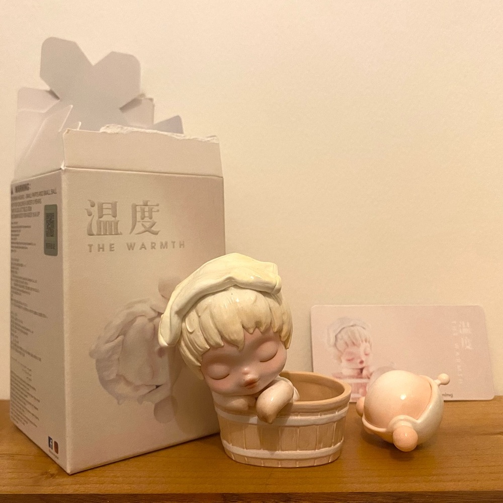 Pop Mart Skullpanda Warmth Series Figure “Loosening”